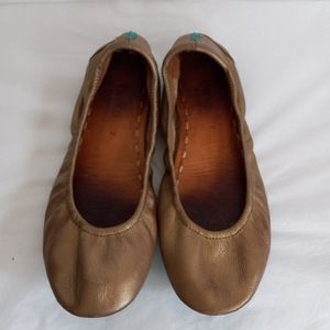 Tieks  gold flats size 7